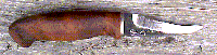 Click here for an enlarged image of the knife
and it's sheath.