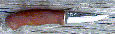 Click here for an enlarged image of the knife
and it's sheath.