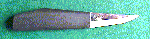Click here for an enlarged image of the knife
and it's sheath.