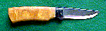 Click here for a larger image of the knife and it's sheath.