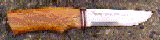 Click here for a larger image of the knife and it's sheath.