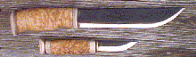 Click here for an enlarged image of the knife
and it's sheath.